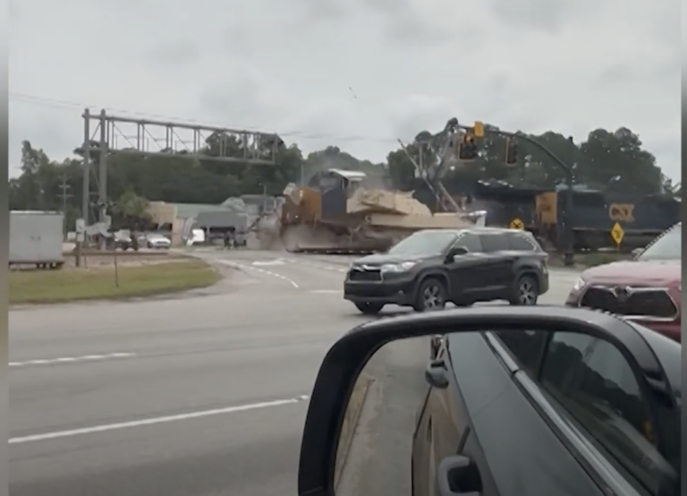 CSX train crashes into tractor-trailer hauling M109 Howitzer